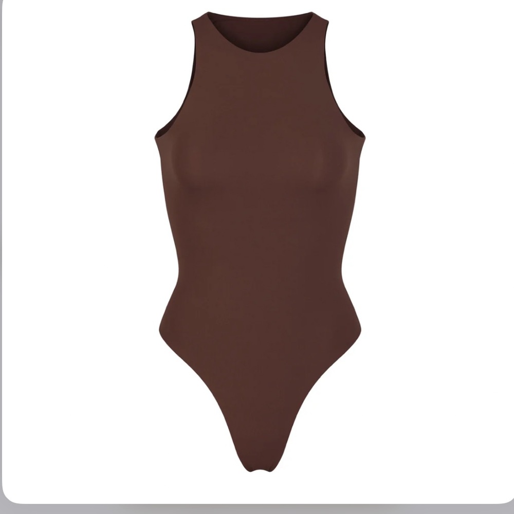 Skims high neck bodysuit in the color COCOA. Size L. Only worn a couple times!